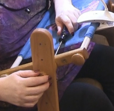 Woman tensioning her lapstand leg kit