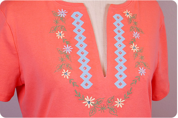 Peach color t-shirt with embroidered  vee neckline