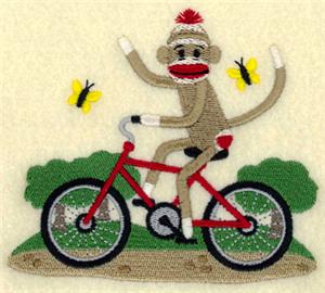 Sock Monkey Riding a Bike