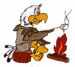 Scout Eagle roasting marshmallows